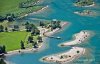Luftaufnahme SEEN/Urnersee Inseln - Foto Badeinseln Flueelen bearbeitet 1126