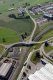 Luftaufnahme EISENBAHN/Kreisel ueber Weiche in Romont FR - Foto Romont 7075