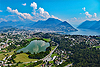 Foto 149: Der Lago di Muzzano mit Lugano TI im Hintergrund.